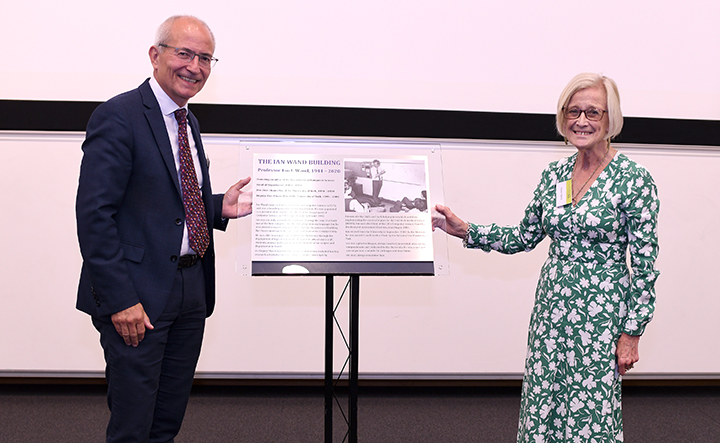 Vice-Chancellor Charlie Jeffery and Helen Wand with a plaque for the Ian Wand building